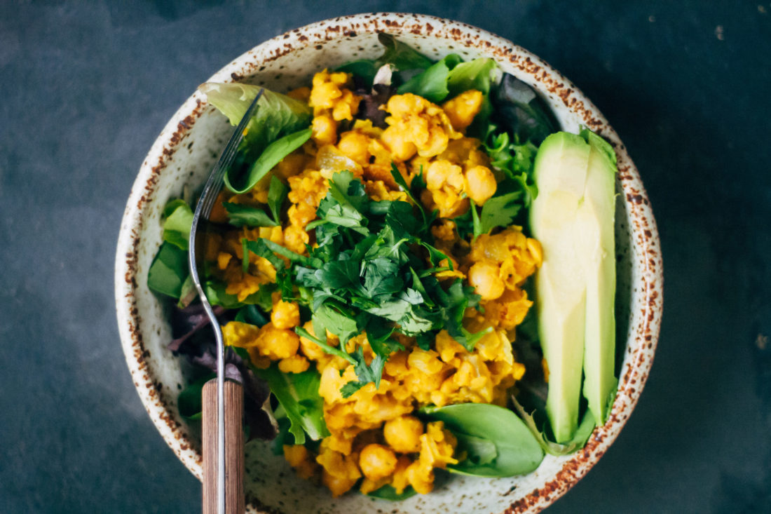 A close-up shot of a bowl filled with a chickpea scramble recipe.